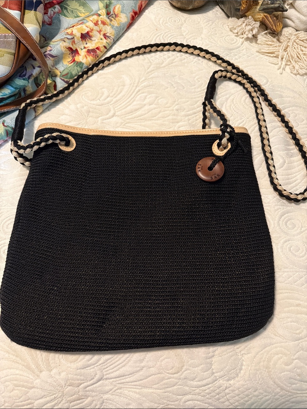 The Sak Black Woven Shoulder Bag with Tan Trim